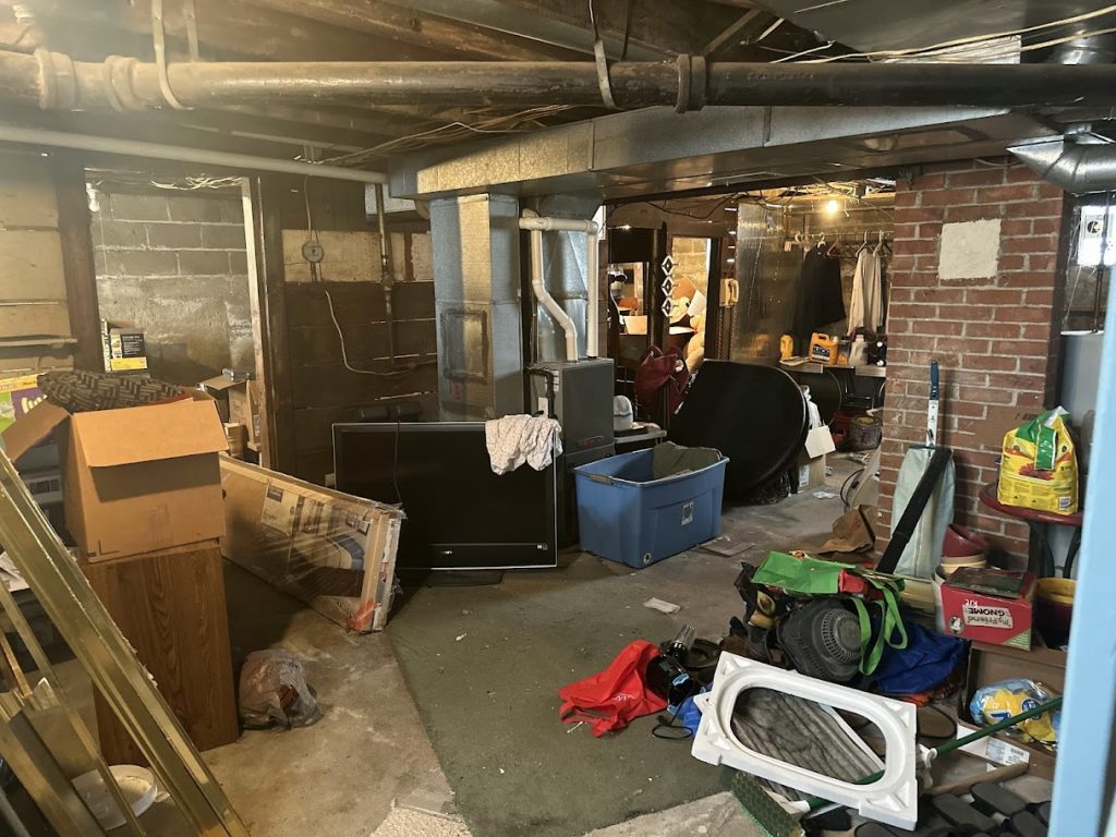 Crawlspace removal service, clearing out clutter and debris.